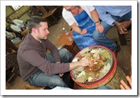Aaron enjoying injera for the first time