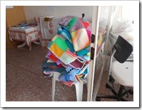 A pile of knitted blankets