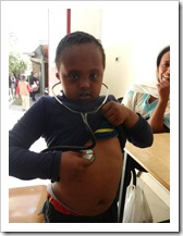 This little Down's lad loved my stethoscope